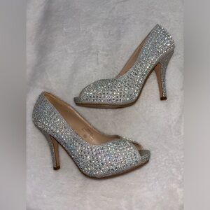 sliver rhinestone heels in size 5.5